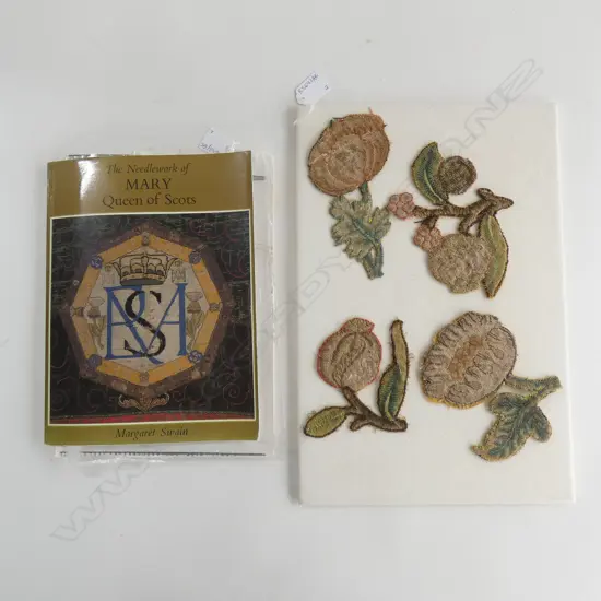 Four 16thC? embroidered flowers; 'slips' and a reference book…